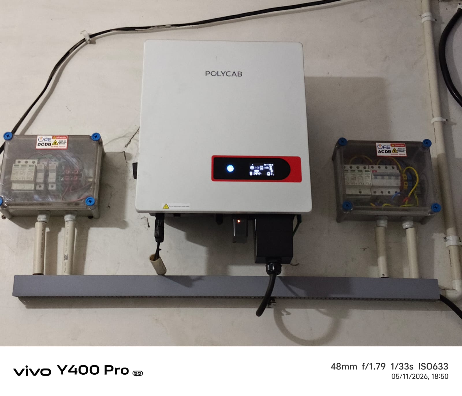 Wide rooftop solar panel array after cleaning in Lucknow